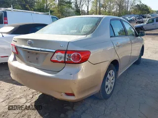 2011 Toyota Corolla L with VIN 2T1BU4EE3BC716134, listed as a IAAI auction lot 41930838 with 238,431 mi miles. Bid and sale history available at carsss.com. Image 4.
