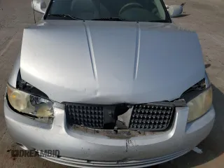 2006 Nissan Sentra S z VIN 3N1CB51D66L620940, wystawiony jako Copart lot #57411225 z przebiegiem 204 380 mil mil oraz Szkoda całkowita • Salvage title. Historia ofert i sprzedaży dostępna na DreamBid. Obrazek 11.
