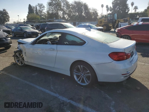 2016 BMW 4 Series 428i xDrive with VIN WBA3N9C57GK248610, listed as a Copart auction lot 84958044 with 62,485 mi miles and Salvage Title. Bid and sale history available at carsss.com. Image 2.