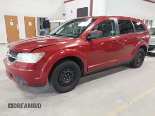 2009 Dodge Journey SXT with VIN 3D4GG57V39T587354, listed as a IAAI auction lot 41989290 with 102,250 mi miles. Bid and sale history available at carsss.com. Image 2.