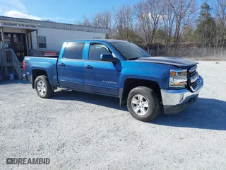 2017 Chevrolet Silverado 1500 LT with VIN 3GCUKREC1HG268291, listed as a IAAI auction lot 41585235 with 128,477 mi miles. Bid and sale history available at carsss.com. Image 1.