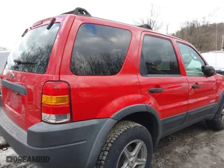 2002 Ford Escape Limited with VIN 1FMCU04132KB53687, listed as a IAAI auction lot 41468556 with 63,875 mi miles. Bid and sale history available at carsss.com. Image 13.