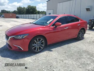 2017 Mazda 6 Grand Touring с VIN JM1GL1W50H1132146, выставлен на аукционе Copart как лот 63407155 с пробегом 66 283 миль миль и Списание • Salvage title. История ставок и продаж доступна на DreamBid. Изображение 1.
