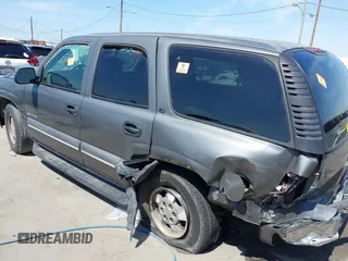 2002 Chevrolet Tahoe LS z VIN 1GNEC13V92R305304, wystawiony jako IAAI lot #41851210 z przebiegiem Nie podano mil oraz . Historia ofert i sprzedaży dostępna na DreamBid. Obrazek 6.