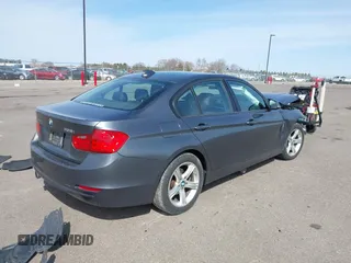 2014 BMW 3 Series 328i xDrive with VIN WBA3B5C50EP540357, listed as a IAAI auction lot 42052651 with 139,971 mi miles and . Bid and sale history available at DreamBid. Image 4.