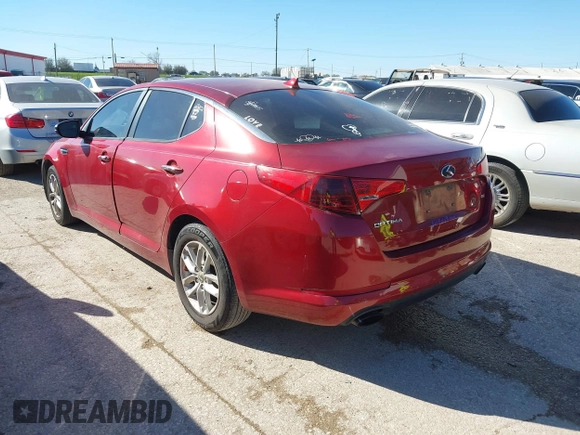 2013 Kia Optima LX z VIN 5XXGM4A70DG252227, wystawiony jako IAAI lot #41808243 z przebiegiem 180 732 mil mil oraz . Historia ofert i sprzedaży dostępna na DreamBid. Obrazek 3.