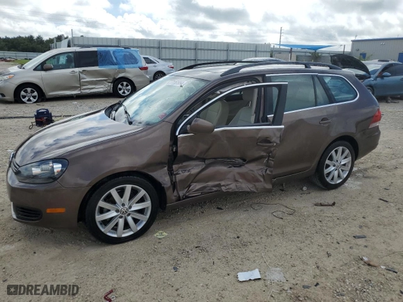 2011 Volkswagen Jetta SportWagen SE with VIN 3VWPX7AJXBM631930, listed as a Copart auction lot 71161954 with 105,577 mi miles and Salvage Title. Bid and sale history available at carsss.com. Image 1.