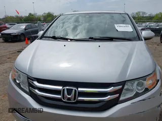 2014 Honda Odyssey EX-L with VIN 5FNRL5H60EB115792, listed as a IAAI auction lot 42064607 with 191,055 mi miles and . Bid and sale history available at carsss.com. Image 12.