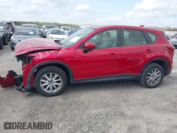 2016 Mazda CX-5 Sport with VIN JM3KE2BY9G0911535, listed as a IAAI auction lot 41906402 with 134,477 mi miles. Bid and sale history available at carsss.com. Image 15.