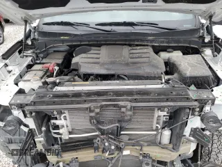 2023 Nissan Titan SV z VIN 1N6AA1ED7PN116504, wystawiony jako Copart lot #77986734 z przebiegiem 31 392 mil mil oraz Szkoda całkowita • Salvage title. Historia ofert i sprzedaży dostępna na DreamBid. Obrazek 11.