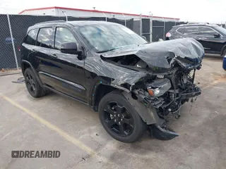 2019 Jeep Grand Cherokee Laredo E with VIN 1C4RJEAGXKC571770, listed as a IAAI auction lot 41677487 with 113,089 mi miles. Bid and sale history available at carsss.com. Image 1.
