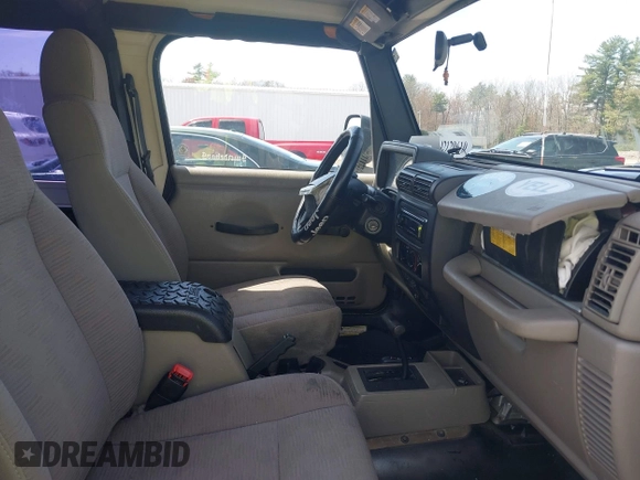 2005 Jeep Wrangler X z VIN 1J4FA39S45P382880, wystawiony jako IAAI lot #42129610 z przebiegiem 191 864 mil mil oraz . Historia ofert i sprzedaży dostępna na DreamBid. Obrazek 5.
