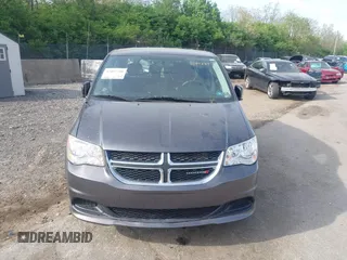 2017 Dodge Grand Caravan SE Plus z VIN 2C4RDGBGXHR549334, wystawiony jako IAAI lot #42097288 z przebiegiem 60 896 mil mil oraz . Historia ofert i sprzedaży dostępna na DreamBid. Obrazek 12.