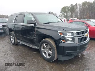 2016 Chevrolet Tahoe LS z VIN 1GNSKAKCXGR458352, wystawiony jako IAAI lot #41541099 z przebiegiem 93 879 mil mil oraz . Historia ofert i sprzedaży dostępna na DreamBid. Obrazek 1.