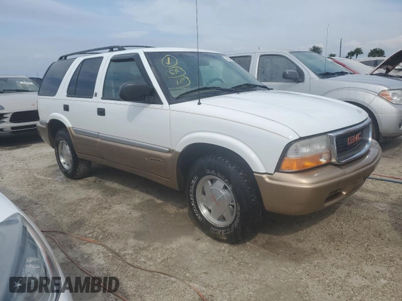 2000 GMC Jimmy SL with VIN 1GKCS13W4Y2106047, listed as a Copart auction lot 75257184 with 73,571 mi miles and Non Repairable. Bid and sale history available at carsss.com. Image 4.