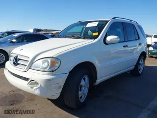 2004 Mercedes-Benz M-Class 3.5L with VIN 4JGAB57E54A482716, listed as a IAAI auction lot 40731487 with 178,587 mi miles. Bid and sale history available at carsss.com. Image 17.