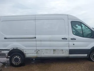 2019 Ford Transit with VIN 1FTYR2CM6KKB19102, listed as a IAAI auction lot 42481530 with 217,976 mi miles and . Bid and sale history available at DreamBid. Image 14.