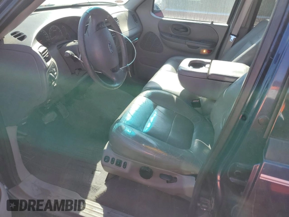 2002 Ford F-150 XLT with VIN 1FTRW08L02KE06257, listed as a Copart auction lot 45004605 with 189,003 mi miles and Salvage Title. Bid and sale history available at carsss.com. Image 7.