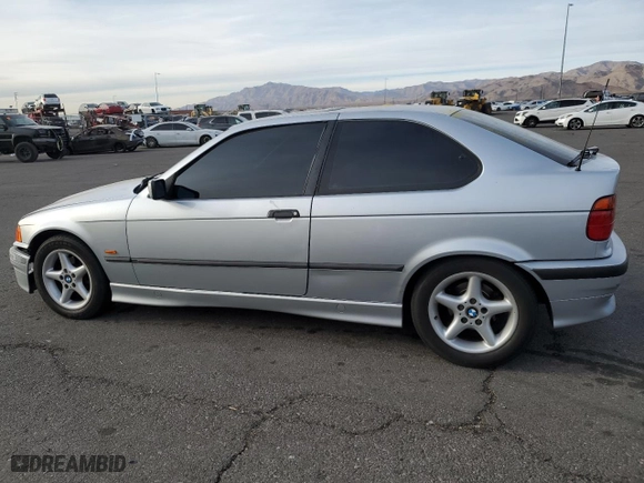 1998 BMW 3-Series 318TI with VIN WBACG7323WKC30210, listed as a Copart auction lot 84531834 with 203,872 mi miles and Salvage Title. Bid and sale history available at carsss.com. Image 2.