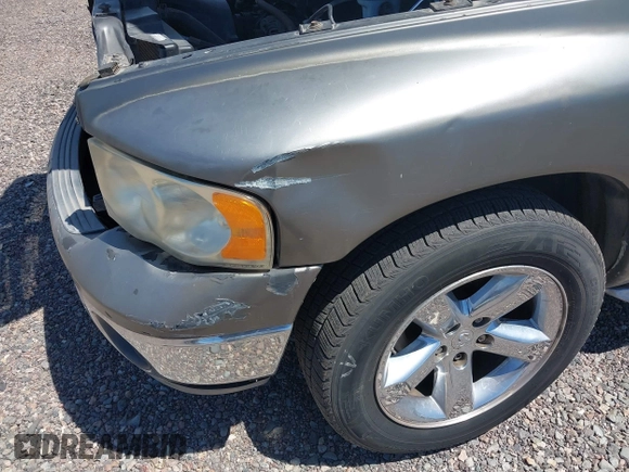2004 Dodge 1500 SLT with VIN 1D7HA18NX4S723229, listed as a IAAI auction lot 42169829 with 228,812 mi miles. Bid and sale history available at carsss.com. Image 6.