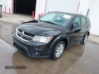 2015 Dodge Journey American Value Pkg with VIN 3C4PDCABXFT637428, listed as a IAAI auction lot 41507850 with 209,050 mi miles. Bid and sale history available at carsss.com. Image 2.