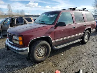 1998 GMC Yukon with VIN 1GKEK13R4WJ719517, listed as a Copart auction lot 44651715 with 230,062 mi miles and Clean Title. Bid and sale history available at carsss.com. Image 1.