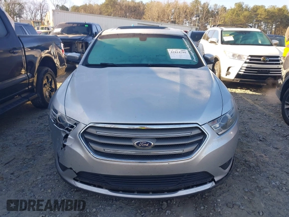2015 Ford Taurus SEL with VIN 1FAHP2E84FG189640, listed as a IAAI auction lot 41814795 with 100,209 mi miles and . Bid and sale history available at DreamBid. Image 12.