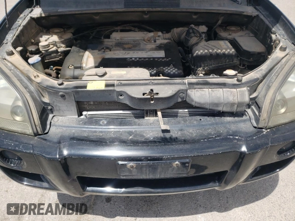 2006 Hyundai Tucson GL with VIN KM8JM12B66U342188, listed as a Copart auction lot 63140444 with 168,587 mi miles and Salvage Title. Bid and sale history available at carsss.com. Image 13.
