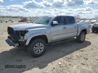 2018 Toyota Tacoma SR with VIN 5TFCZ5ANXJX123727, listed as a Copart auction lot 52801205 with 79,987 mi miles and Salvage title. Bid and sale history available at DreamBid. Image 1.