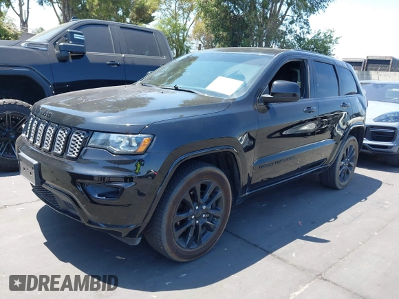 2019 Jeep Grand Cherokee Altitude with VIN 1C4RJFAG1KC845542, listed as a IAAI auction lot 42715201 with 62,461 mi miles and . Bid and sale history available at DreamBid. Image 2.
