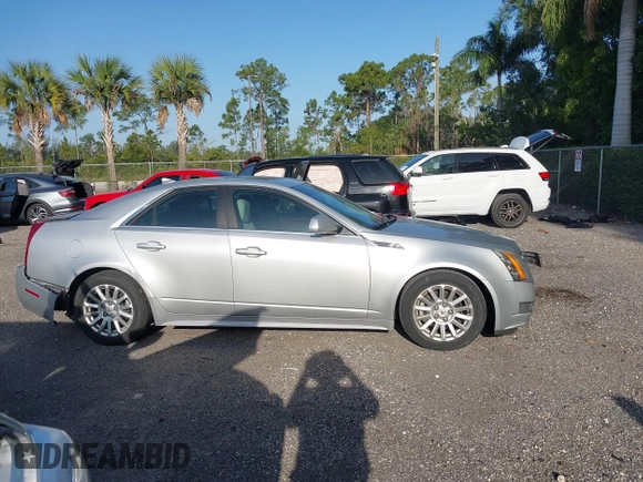 2010 Cadillac CTS Luxury with VIN 1G6DE5EG9A0144317, listed as a IAAI auction lot 42093890 with 70,099 mi miles. Bid and sale history available at carsss.com. Image 13.