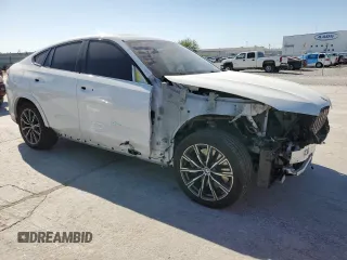 2020 BMW X6 xDrive40i z VIN 5UXCY6C00L9D45082, wystawiony jako Copart lot #52588665 z przebiegiem 40 810 mil mil oraz Szkoda całkowita • Salvage title. Historia ofert i sprzedaży dostępna na DreamBid. Obrazek 4.
