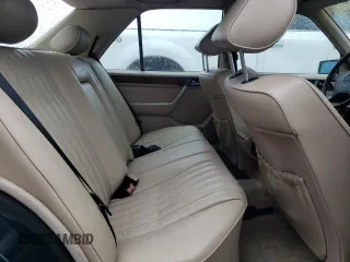 1995 Mercedes-Benz E Class with VIN WDBEB31E6SC142087, listed as a Copart auction lot 84019814 with 231,961 mi miles and Salvage Title. Bid and sale history available at carsss.com. Image 10.