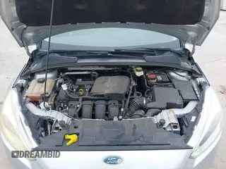2017 Ford Focus S z VIN 1FADP3E28HL210368, wystawiony jako IAAI lot #42260711 z przebiegiem 69 067 mil mil oraz . Historia ofert i sprzedaży dostępna na DreamBid. Obrazek 10.