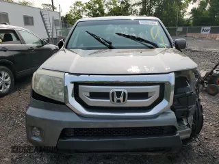 2009 Honda Pilot EX-L z VIN 5FNYF48559B004021, wystawiony jako Copart lot #59282595 z przebiegiem 215 844 mil mil oraz Nie do naprawy • Non repairable. Historia ofert i sprzedaży dostępna na DreamBid. Obrazek 5.