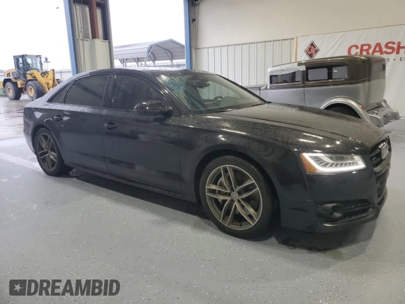 2017 Audi A8 Sport z VIN WAU43AFD4HN020515, wystawiony jako Copart lot #44953055 z przebiegiem 115 422 mil mil oraz Szkody całkowita. Historia ofert i sprzedaży dostępna na DreamBid. Obrazek 4.