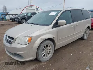 2014 Dodge Grand Caravan SXT z VIN 2C4RDGCG8ER253786, wystawiony jako IAAI lot #41771226 z przebiegiem 175 507 mil mil oraz . Historia ofert i sprzedaży dostępna na DreamBid. Obrazek 17.