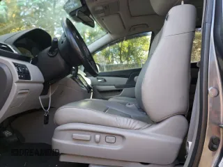 2014 Honda Odyssey Touring z VIN 5FNRL5H98EB512144, wystawiony jako Copart lot #69987533 z przebiegiem 184 231 mil mil oraz Szkoda całkowita • Salvage title. Historia ofert i sprzedaży dostępna na DreamBid. Obrazek 7.