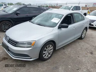2015 Volkswagen Jetta Sedan 1.8T SE with VIN 3VWD17AJ0FM309503, listed as a IAAI auction lot 42127051 with 223,725 mi miles. Bid and sale history available at carsss.com. Image 2.