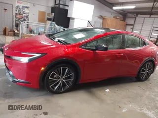 2024 Toyota Prius LE with VIN JTDACAAUXR3039886, listed as a IAAI auction lot 41928633 with 1,468 mi miles and . Bid and sale history available at DreamBid. Image 14.