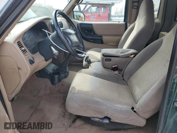 1999 Mazda B-Series Truck SE with VIN 4F4ZR17X2XTM25631, listed as a Copart auction lot 51625715 with 204,134 mi miles and Salvage Title. Bid and sale history available at DreamBid. Image 7.