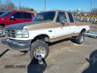 1996 Ford F-150 with VIN 1FTEX14N4TKA28292, listed as a IAAI auction lot 41422154 with 173,728 mi miles. Bid and sale history available at carsss.com. Image 2.