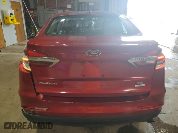 2020 Ford Fusion SE z VIN 3FA6P0HD1LR245199, wystawiony jako Copart lot #51673595 z przebiegiem 90 003 mil mil oraz Czysty tytuł • Clean title. Historia ofert i sprzedaży dostępna na DreamBid. Obrazek 6.