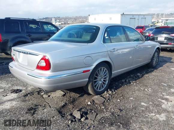 2006 Jaguar XJ with VIN SAJWA71B96SH04571, listed as a IAAI auction lot 41574323 with 1 mi miles. Bid and sale history available at carsss.com. Image 4.