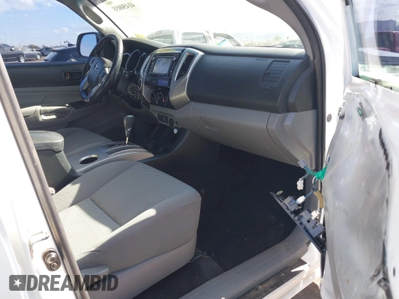 2014 Toyota Tacoma with VIN 3TMMU4FN9EM062808, listed as a IAAI auction lot 41450058 with 192,628 mi miles and . Bid and sale history available at DreamBid. Image 5.