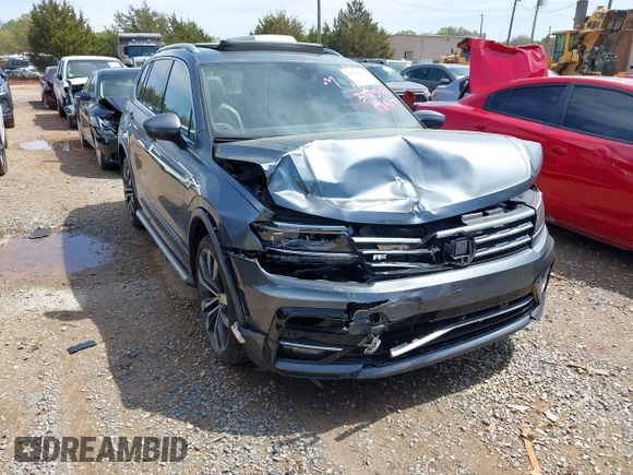 2018 Volkswagen Tiguan SEL Premium with VIN 3VV5B7AX4JM201579, listed as a IAAI auction lot 41932201 with 118,728 mi miles and . Bid and sale history available at DreamBid. Image 1.