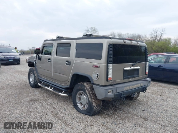 2004 Hummer H2 z VIN 5GRGN23U94H100078, wystawiony jako IAAI lot #42028741 z przebiegiem 106 795 mil mil oraz . Historia ofert i sprzedaży dostępna na DreamBid. Obrazek 3.