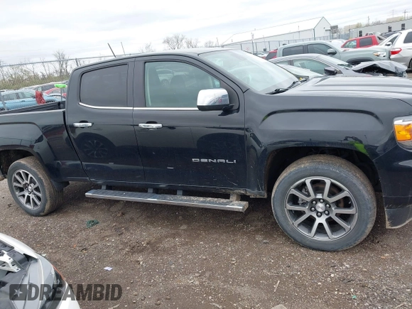 2021 GMC Canyon 4WD Denali with VIN 1GTG6EEN6M1260580, listed as a IAAI auction lot 41918693 with 52,085 mi miles. Bid and sale history available at carsss.com. Image 13.
