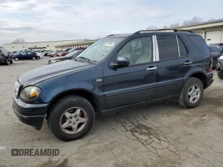 2001 Mercedes-Benz M-Class with VIN 4JGAB54E61A276417, listed as a Copart auction lot 82878094 with 205,577 mi miles and Salvage Title. Bid and sale history available at carsss.com. Image 1.