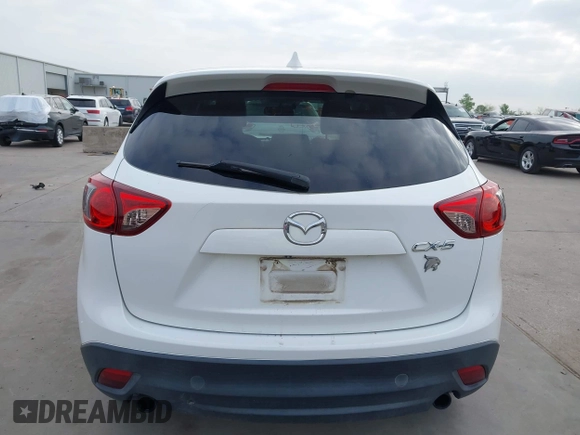 2013 Mazda CX-5 Grand Touring with VIN JM3KE2DEXD0166115, listed as a IAAI auction lot 41919164 with 102,999 mi miles and . Bid and sale history available at carsss.com. Image 17.